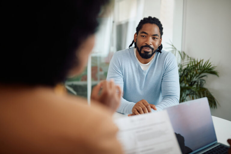 man interviewing for a job and answering most common interview questions