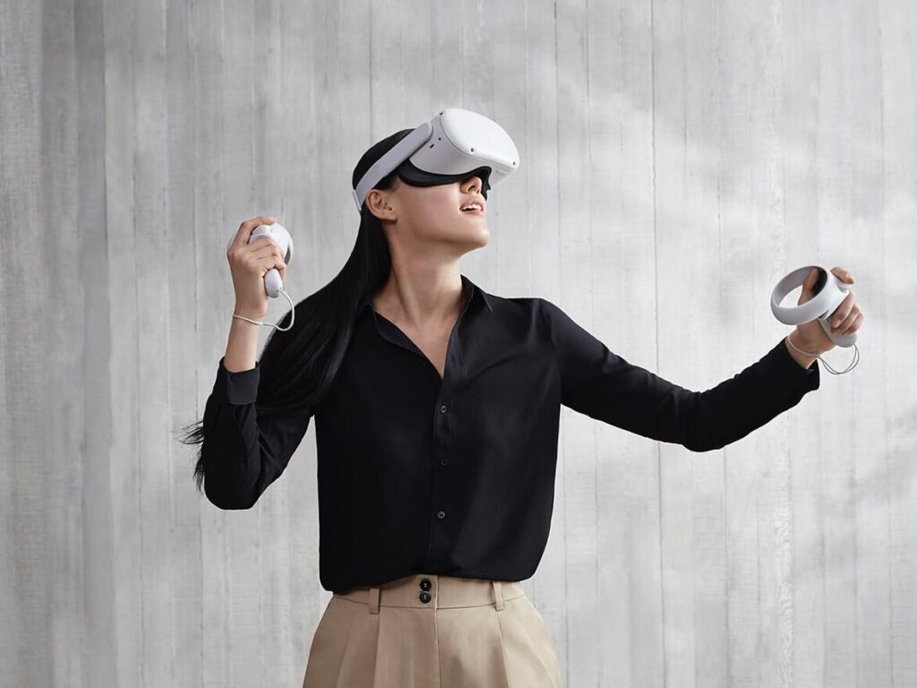 Woman using VR technology headset