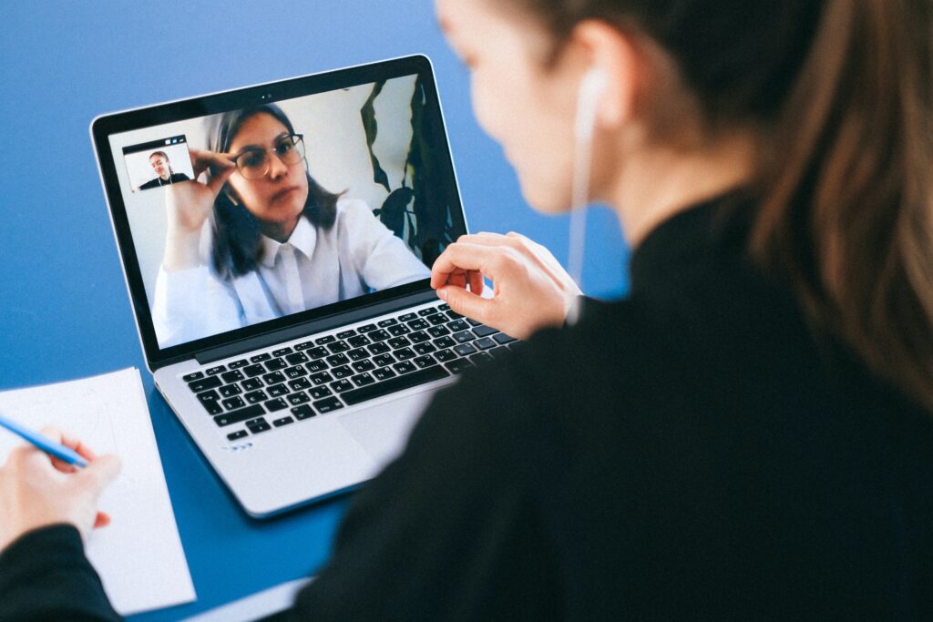 Two women in a virtual interview