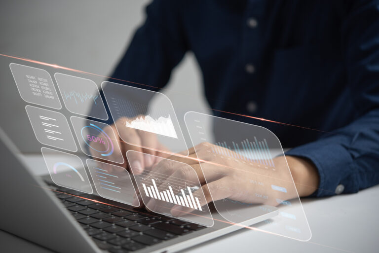 IT analyst using a computer to analyze data